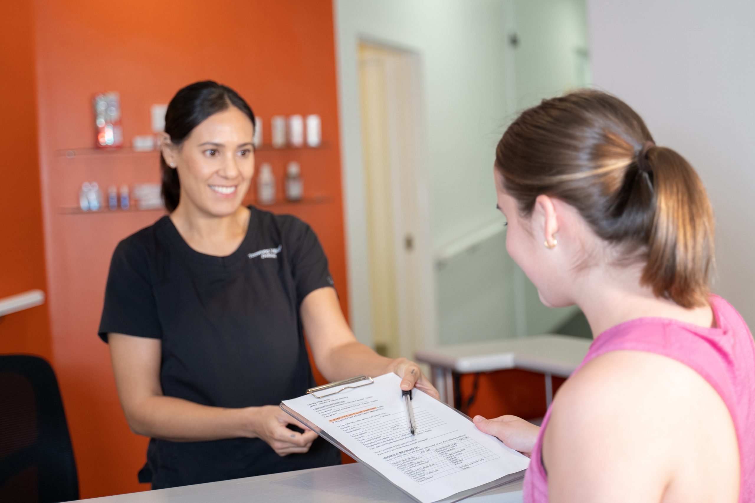 Toowong Village Dental-42 Receptionist Sam helping a Toowong Village Dental patient